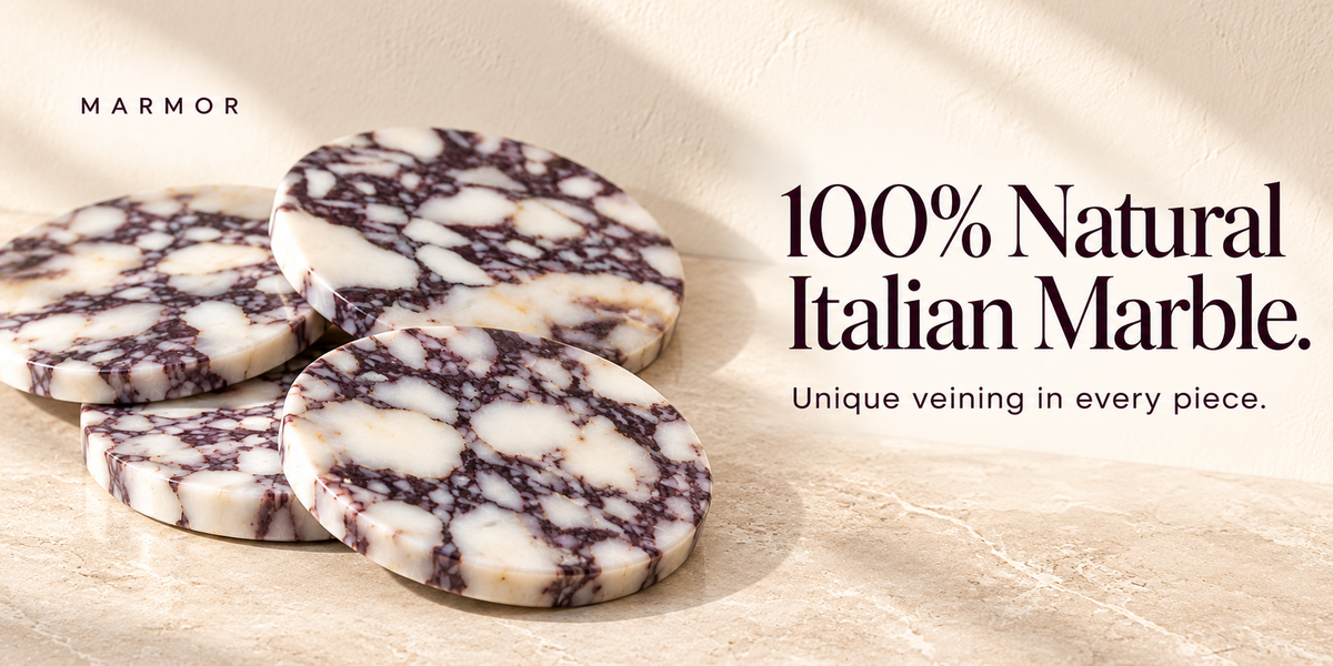 Four round purple marble coasters showing unique white stone patterns and dark purple veining.