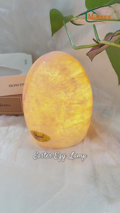 Close-Up of Easter Egg Marble Touch Lamp and Stone Texture