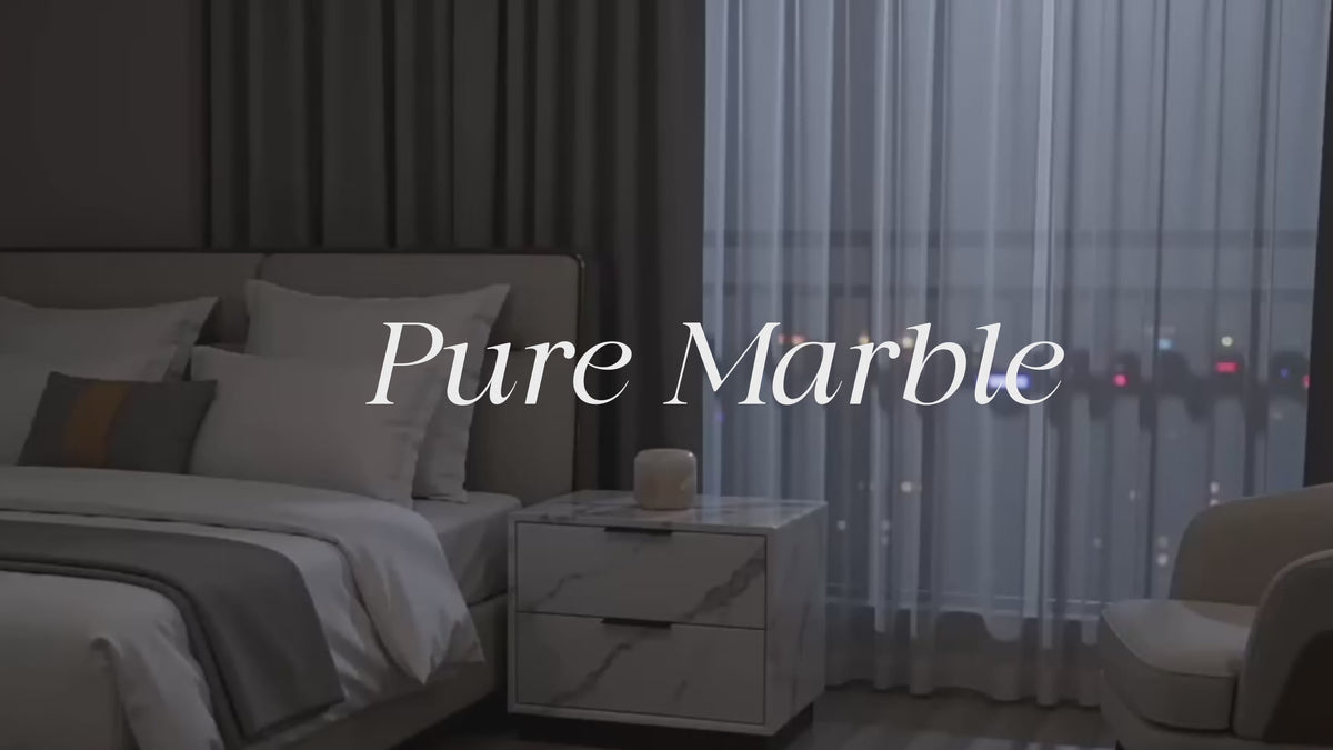 Load video: Product demonstration of the Marmor Ancient Emerald natural marble touch lamp, showing its illuminated green marble shade.